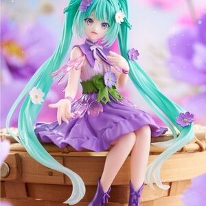 Purple and Green Anime Figurine